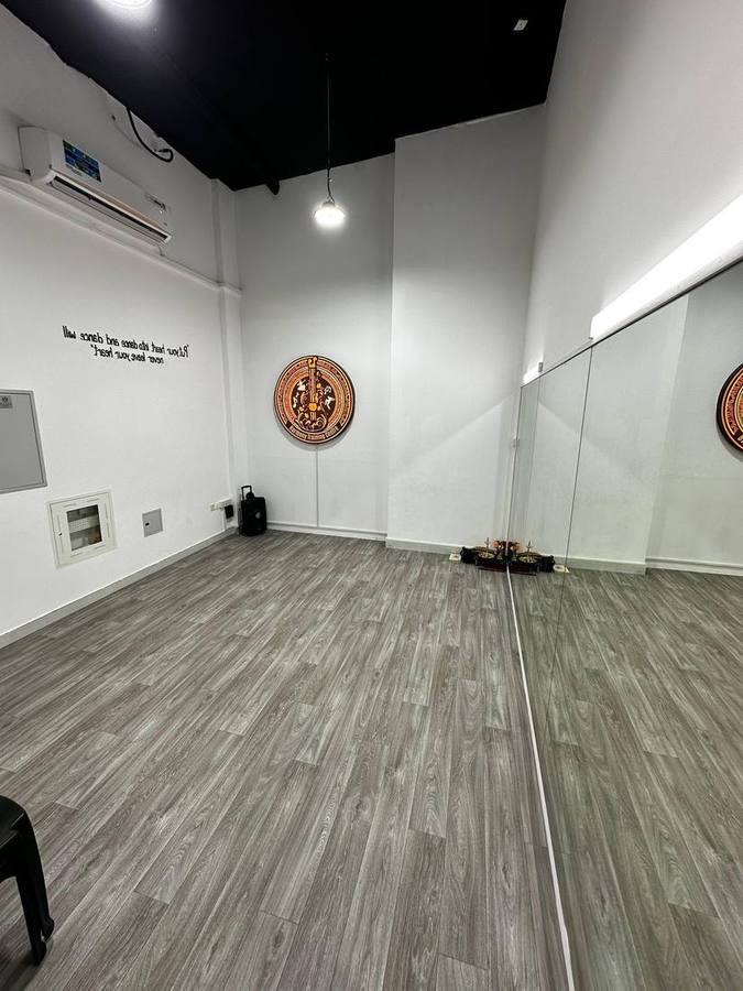 Empty dance studio with mirrored wall